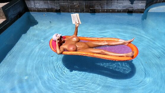 Big tits in a pool