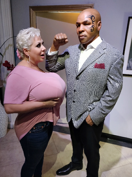 Claudia Marie offers up her big fake tits to Mike Tyson